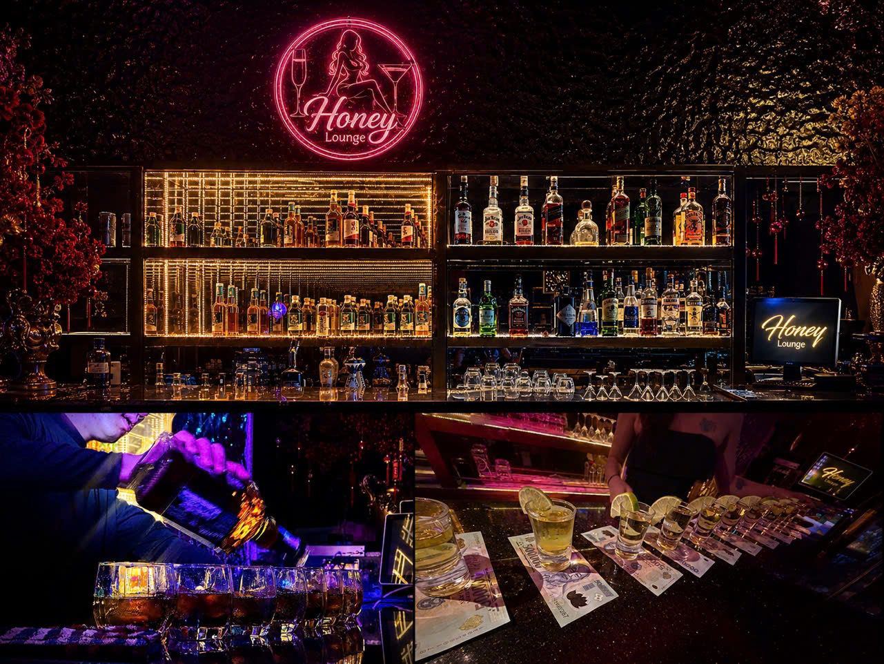 Premium spirits wall at Honey Bar Saigon